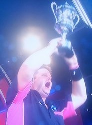 Scott lifting the BDO World trophy
